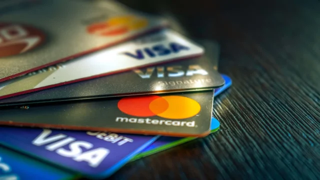 Will Lower Interest Rates Help You Escape Credit Card Debt? Experts Weigh In